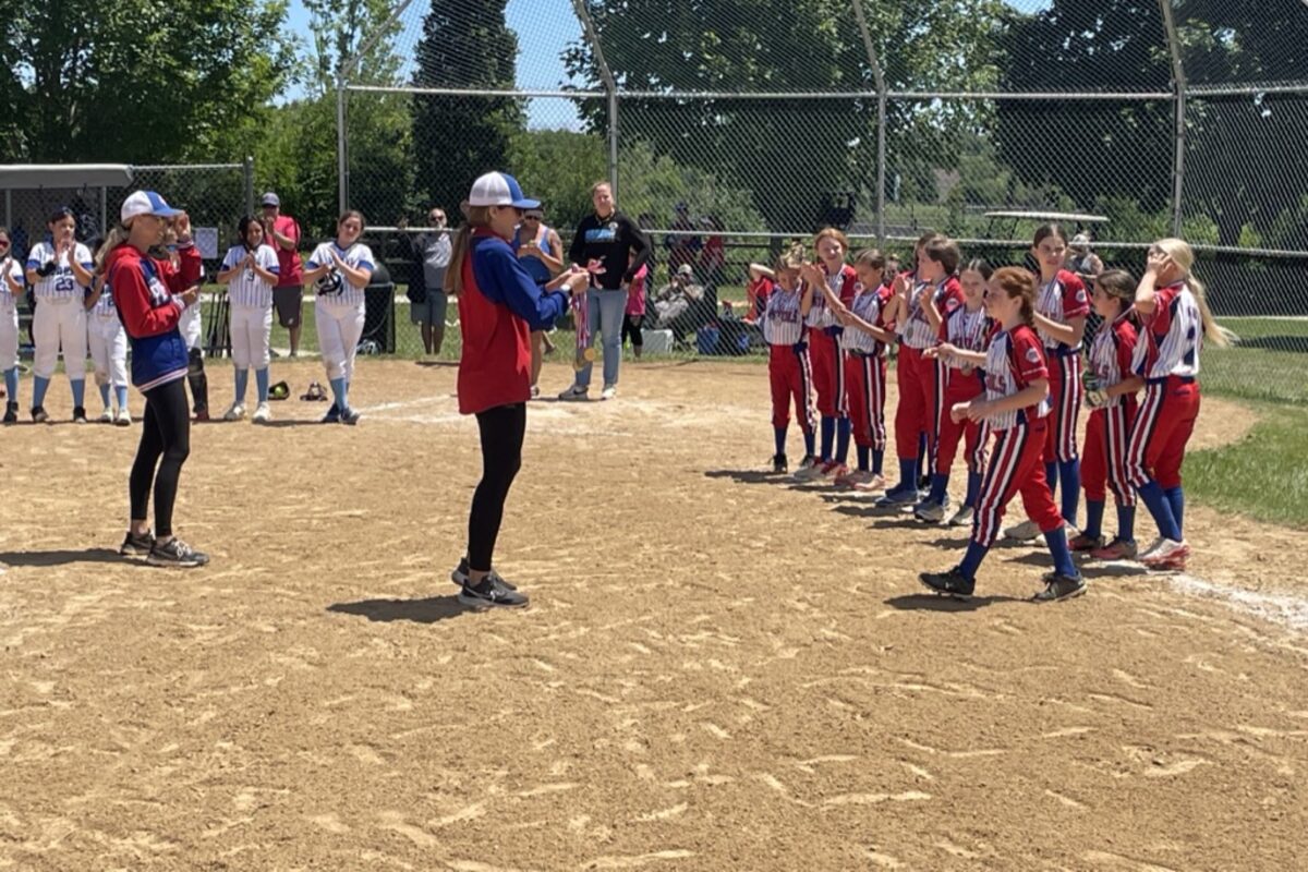 Park Ridge Pistols 10U White lining up for medals at the Warren Wave tournament