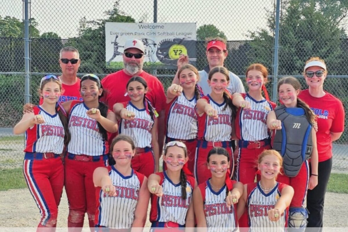 Park Ridge Pistols 12U Blue with their Evergreen Park championship rings